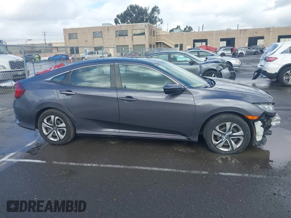 2017 Honda Civic LX z VIN 2HGFC2F50HH540361, wystawiony jako IAAI lot #41809159 z przebiegiem 96 590 mil mil oraz . Historia ofert i sprzedaży dostępna na DreamBid. Obrazek 14.