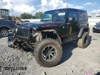 2010 Jeep Wrangler Rubicon with VIN 1J4BA6D10AL109001, listed as a Copart auction lot 69453954 with 137,821 mi miles and Salvage title. Bid and sale history available at DreamBid. Image 1.
