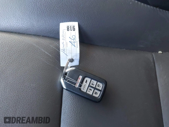 2014 Honda Odyssey Touring with VIN 5FNRL5H92EB016546, listed as a IAAI auction lot 41689148 with 143,601 mi miles and . Bid and sale history available at DreamBid. Image 11.