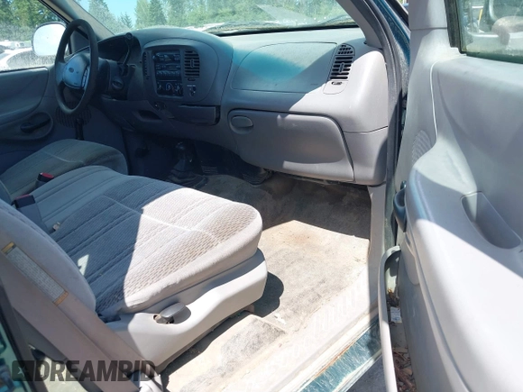 1998 Ford F-150 z VIN 2FTZX18W5WCA21252, wystawiony jako IAAI lot #42479264 z przebiegiem 259 489 mil mil oraz . Historia ofert i sprzedaży dostępna na DreamBid. Obrazek 5.