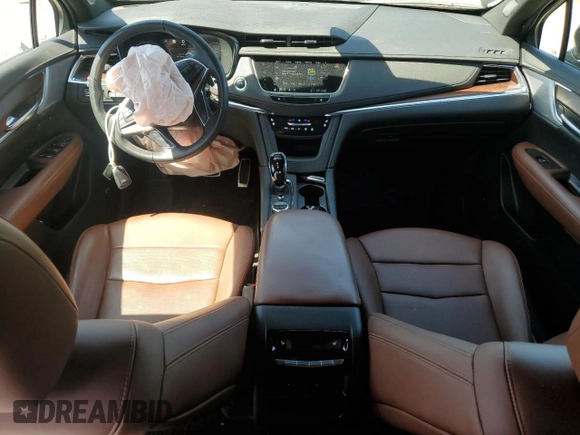 2023 Cadillac XT5 AWD Sport with VIN 1GYKNGRS8PZ100581, listed as a Copart auction lot 55157035 with 14,637 mi miles and Salvage title. Bid and sale history available at DreamBid. Image 8.