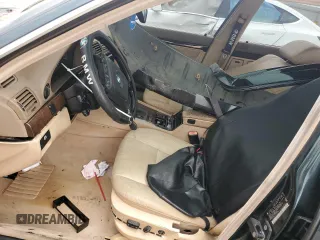 1998 BMW 7 Series 740il with VIN WBAGJ8329WDM24296, listed as a Copart auction lot 73581634 with 247,498 mi miles and Salvage Title. Bid and sale history available at carsss.com. Image 7.