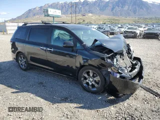 2015 Toyota Sienna SE with VIN 5TDXK3DC1FS655269, listed as a Copart auction lot 53682015 with 100,686 mi miles and Salvage Title. Bid and sale history available at DreamBid. Image 4.