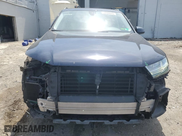 2017 Audi Q7 Premium Plus with VIN WA1LAAF7XHD033350, listed as a Copart auction lot 54946615 with 136,934 mi miles and Salvage Title. Bid and sale history available at DreamBid. Image 5.