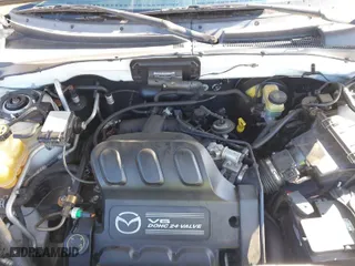 2003 Mazda Tribute ES with VIN 4F2CZ96113KM54743, listed as a IAAI auction lot 41640604 with 171,648 mi miles. Bid and sale history available at carsss.com. Image 10.