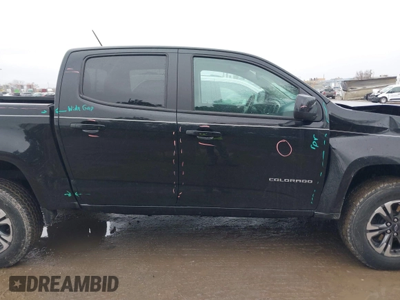2021 Chevrolet Colorado 4WD Z71 with VIN 1GCGTDEN7M1282445, listed as a IAAI auction lot 41737419 with 27,187 mi miles and . Bid and sale history available at DreamBid. Image 13.