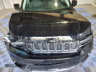 2023 Jeep Grand Cherokee Laredo with VIN 1C4RJHAG7P8866871, listed as a Copart auction lot 58341235 with 48,737 mi miles and Salvage title. Bid and sale history available at DreamBid. Image 12.