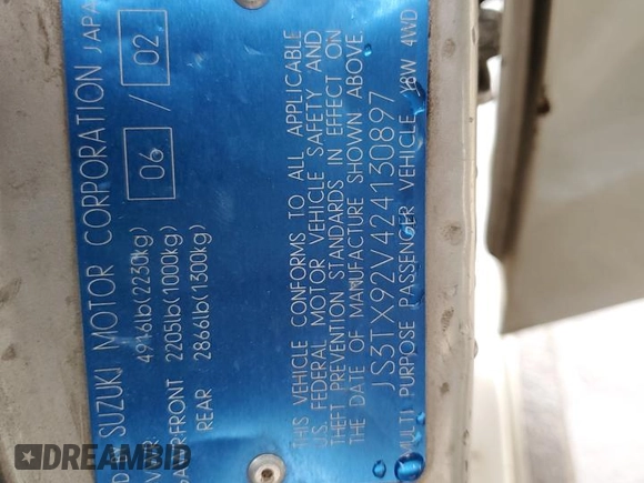 2002 Suzuki XL7 Standard z VIN JS3TX92V424130897, wystawiony jako Copart lot #84635434 z przebiegiem 208 447 mil mil oraz Szkoda całkowita • Salvage title. Historia ofert i sprzedaży dostępna na DreamBid. Obrazek 14.