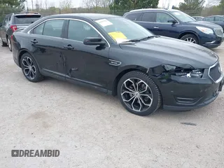 2013 Ford Taurus SHO z VIN 1FAHP2KT1DG234863, wystawiony jako IAAI lot #42147383 z przebiegiem 126 181 mil mil oraz . Historia ofert i sprzedaży dostępna na DreamBid. Obrazek 1.