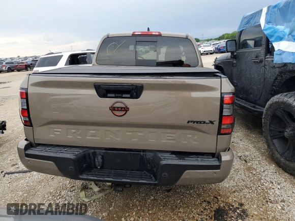 2024 Nissan Frontier SL with VIN 1N6ED1EJ4RN657334, listed as a Copart auction lot 55169675 with 5,706 mi miles and Salvage title. Bid and sale history available at DreamBid. Image 6.