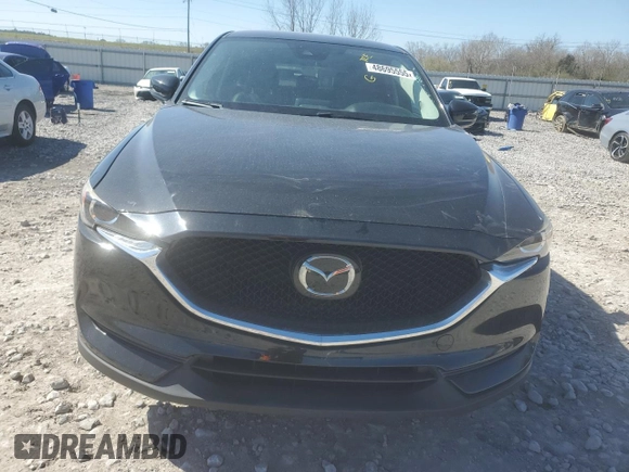2020 Mazda CX-5 Touring with VIN JM3KFACM9L0733719, listed as a Copart auction lot 48695555 with 93,092 mi miles and Salvage Title. Bid and sale history available at carsss.com. Image 5.