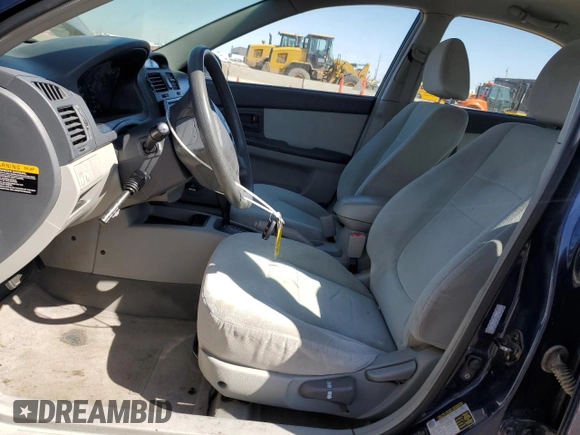 2006 Kia Spectra EX with VIN KNAFE121965253446, listed as a Copart auction lot 53084675 with 195,488 mi miles and Salvage Title. Bid and sale history available at DreamBid. Image 7.