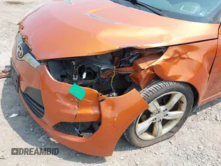 2012 Hyundai Veloster w/Gray Int с VIN KMHTC6AD0CU043402, выставлен на аукционе IAAI как лот 42406321 с пробегом 116 734 миль миль и . История ставок и продаж доступна на DreamBid. Изображение 6.