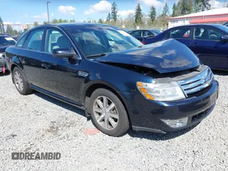 2008 Ford Taurus SEL with VIN 1FAHP24W98G140677, listed as a IAAI auction lot 42087217 with 151,693 mi miles. Bid and sale history available at carsss.com. Image 1.