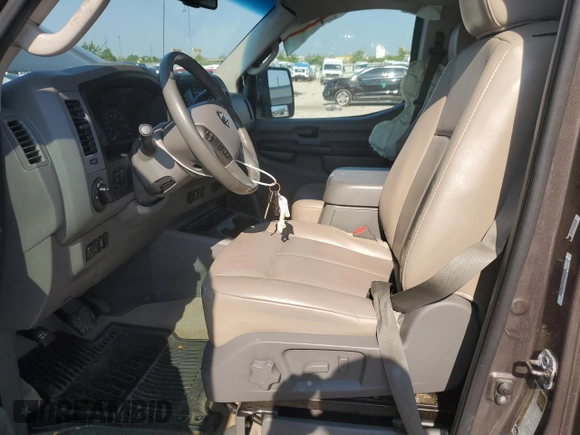 2015 Nissan NV SL с VIN 5BZAF0AA7FN852495, выставлен на аукционе Copart как лот 59935005 с пробегом 175 929 миль миль и Списание • Salvage title. История ставок и продаж доступна на DreamBid. Изображение 7.