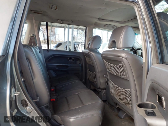 2007 Honda Pilot EX-L with VIN 5FNYF18777B012649, listed as a IAAI auction lot 42070873 with 167,419 mi miles and . Bid and sale history available at DreamBid. Image 8.