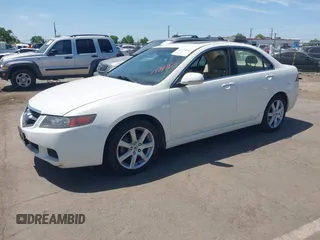2004 Acura TSX w/Navigation with VIN JH4CL96924C024964, listed as a IAAI auction lot 42372283 with 206,892 mi miles and . Bid and sale history available at DreamBid. Image 2.