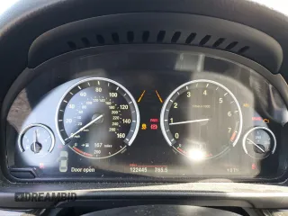 2012 BMW 5 Series 550i with VIN WBAFR9C58CDV59205, listed as a Copart auction lot 53656755 with 122,445 mi miles and Salvage Title. Bid and sale history available at carsss.com. Image 9.