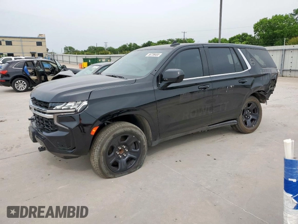 2023 Chevrolet Tahoe Commercial with VIN 1GNSCLED7PR428027, listed as a Copart auction lot 56738455 with 6,599 mi miles and Salvage title. Bid and sale history available at DreamBid. Image 1.