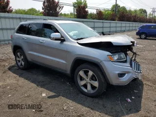 2014 Jeep Grand Cherokee Limited with VIN 1C4RJFBG9EC501136, listed as a Copart auction lot 59873595 with 203,819 mi miles and Salvage title. Bid and sale history available at DreamBid. Image 4.