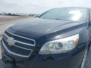 2013 Chevrolet Malibu LT with VIN 1G11C5SA8DU128525, listed as a IAAI auction lot 42034138 with 149,829 mi miles and . Bid and sale history available at DreamBid. Image 12.