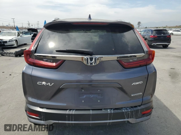 2022 Honda CR-V Touring z VIN 7FARW2H96NE052072, wystawiony jako Copart lot #52214465 z przebiegiem 63 832 mil mil oraz Szkoda całkowita • Salvage title. Historia ofert i sprzedaży dostępna na DreamBid. Obrazek 6.