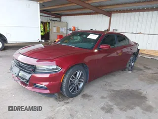 2019 Dodge Charger SXT with VIN 2C3CDXJG0KH757909, listed as a IAAI auction lot 41597907 with 71,882 mi miles and . Bid and sale history available at DreamBid. Image 17.