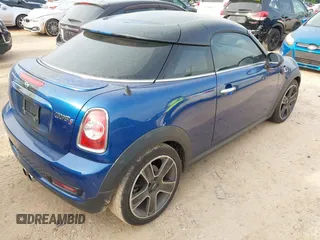 2014 MINI Coupe S z VIN WMWSX3C53ET772993, wystawiony jako IAAI lot #42266901 z przebiegiem 139 678 mil mil oraz . Historia ofert i sprzedaży dostępna na DreamBid. Obrazek 4.