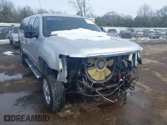 2011 GMC Sierra 2500HD SLT z VIN 1GT121C86BF242488, wystawiony jako IAAI lot #41644211 z przebiegiem 163 233 mil mil oraz . Historia ofert i sprzedaży dostępna na DreamBid. Obrazek 1.