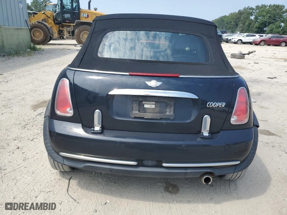 2006 MINI Cooper Convertible with VIN WMWRF33596TG15250, listed as a Copart auction lot 69087234 with 152,716 mi miles and Salvage Title. Bid and sale history available at carsss.com. Image 6.