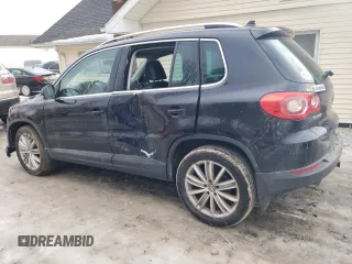 2011 Volkswagen Tiguan SEL with VIN WVGBV7AX4BW553986, listed as a Copart auction lot 43873765 with 140,097 mi miles and Salvage Title. Bid and sale history available at DreamBid. Image 2.