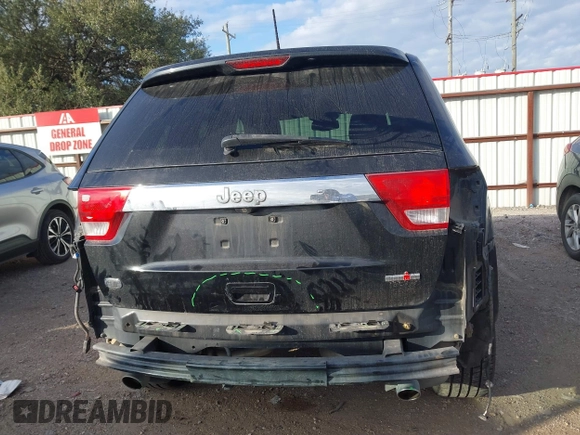 2013 Jeep Grand Cherokee Overland with VIN 1C4RJECT2DC546634, listed as a IAAI auction lot 41180807 with 111,897 mi miles. Bid and sale history available at carsss.com. Image 17.