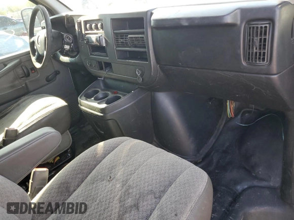 2013 Chevrolet Express Cargo с VIN 1GCWGFBA2D1115617, выставлен на аукционе Copart как лот 61756645 с пробегом 302 668 миль миль и Списание • Salvage title. История ставок и продаж доступна на DreamBid. Изображение 8.