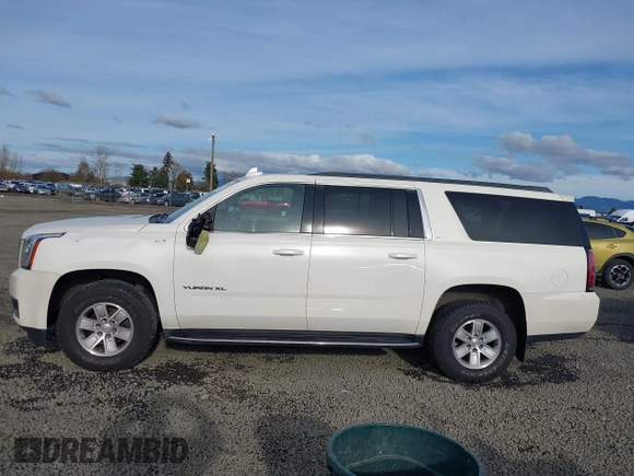 2015 GMC Yukon XL SLT with VIN 1GKS2HKC3FR586338, listed as a IAAI auction lot 41632662 with 149,133 mi miles. Bid and sale history available at carsss.com. Image 14.