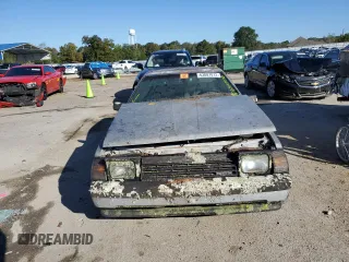 1984 Toyota Celica z VIN JT2RA64C7E6218560, wystawiony jako Copart lot #63087872 z przebiegiem 168 288 mil mil oraz Czysty tytuł • Clean title. Historia ofert i sprzedaży dostępna na DreamBid. Obrazek 9.