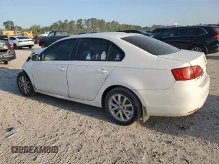 2012 Volkswagen Jetta SE with VIN 3VWBP7AJ6CM003102, listed as a Copart auction lot 52723985 with 224,706 mi miles and Salvage title. Bid and sale history available at DreamBid. Image 2.