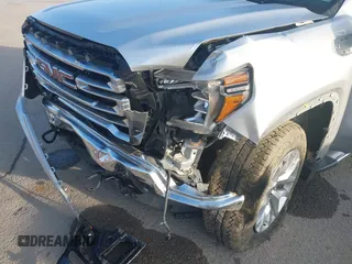 2021 GMC Sierra 1500 SLT z VIN 3GTU9DED7MG250461, wystawiony jako IAAI lot #41460881 z przebiegiem 89 344 mil mil oraz . Historia ofert i sprzedaży dostępna na DreamBid. Obrazek 6.
