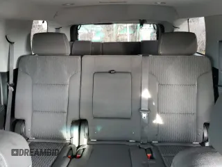 2018 Chevrolet Tahoe LS z VIN 1GNSKAKC8JR215839, wystawiony jako Copart lot #52627955 z przebiegiem 96 380 mil mil oraz Szkoda całkowita • Salvage title. Historia ofert i sprzedaży dostępna na DreamBid. Obrazek 10.
