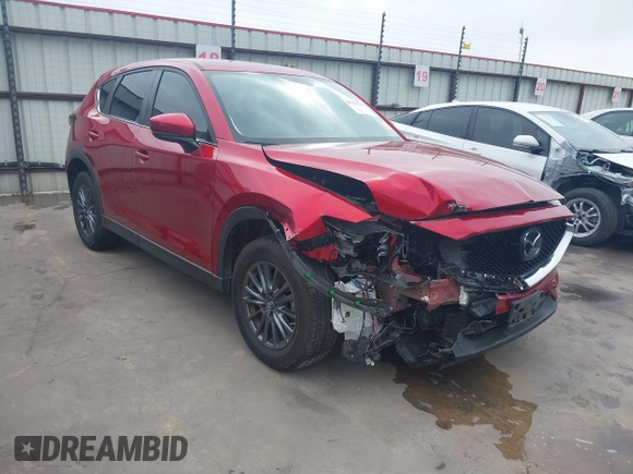 2019 Mazda CX-5 Touring with VIN JM3KFACM7K0696815, listed as a IAAI auction lot 41921763 with 46,900 mi miles. Bid and sale history available at carsss.com. Image 1.