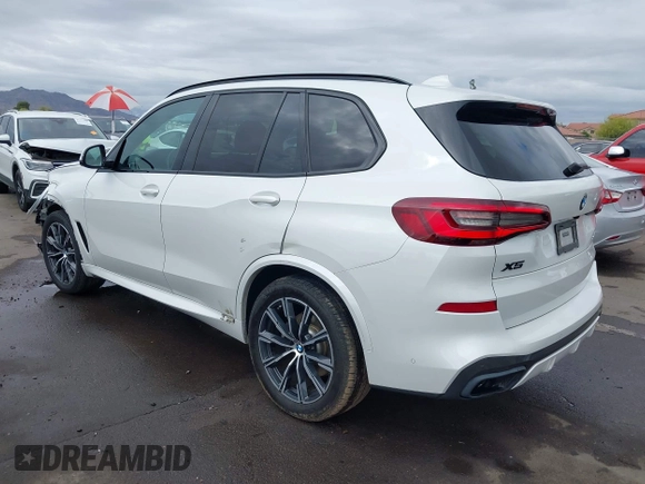 2020 BMW X5 sDrive40i with VIN 5UXCR4C04L9D41635, listed as a IAAI auction lot 42201174 with 64,989 mi miles and . Bid and sale history available at DreamBid. Image 3.