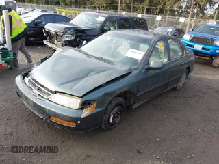 1997 Honda Accord Value with VIN 1HGCD5686VA189722, listed as a IAAI auction lot 41494380 with 205,514 mi miles and . Bid and sale history available at carsss.com. Image 17.