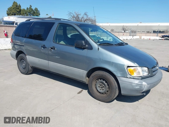 1999 Toyota Sienna LE with VIN 4T3ZF13C1XU097653, listed as a IAAI auction lot 41765274 with 236,625 mi miles. Bid and sale history available at carsss.com. Image 1.