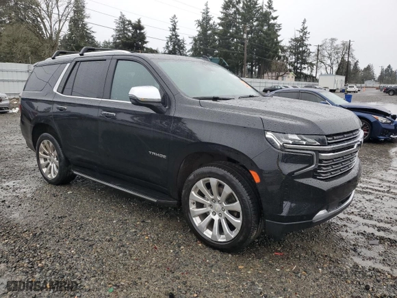 2021 Chevrolet Tahoe Premier with VIN 1GNSKSKD5MR231077, listed as a Copart auction lot 84274084 with 53,932 mi miles and Salvage Title. Bid and sale history available at carsss.com. Image 4.