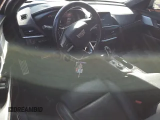 2021 Cadillac CT4 V-Series z VIN 1G6DH5RLXM0124791, wystawiony jako Copart lot #77314844 z przebiegiem 61 452 mil mil oraz Nie do naprawy • Non repairable. Historia ofert i sprzedaży dostępna na DreamBid. Obrazek 8.
