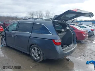 2011 Honda Odyssey Touring with VIN 5FNRL5H95BB007514, listed as a IAAI auction lot 41402516 with 281,032 mi miles. Bid and sale history available at carsss.com. Image 3.