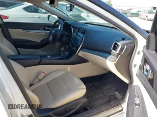2017 Nissan Maxima SV with VIN 1N4AA6AP3HC389930, listed as a IAAI auction lot 42343554 with 128,926 mi miles and . Bid and sale history available at DreamBid. Image 5.