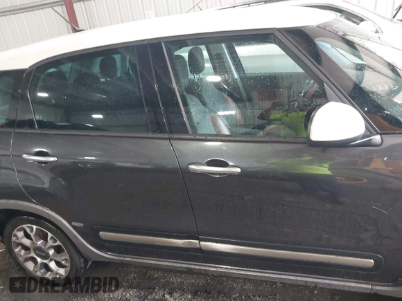 2014 FIAT 500L Trekking with VIN ZFBCFADH6EZ017800, listed as a IAAI auction lot 42572995 with 99,646 mi miles and . Bid and sale history available at DreamBid. Image 13.