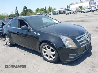 2009 Cadillac CTS RWD z VIN 1G6DV57VX90159318, wystawiony jako IAAI lot #42345939 z przebiegiem 162 931 mil mil oraz . Historia ofert i sprzedaży dostępna na DreamBid. Obrazek 1.
