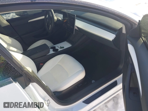 2021 Tesla Model 3 Performance with VIN 5YJ3E1EC1MF063445, listed as a IAAI auction lot 41293243 with 43,143 mi miles and . Bid and sale history available at DreamBid. Image 5.