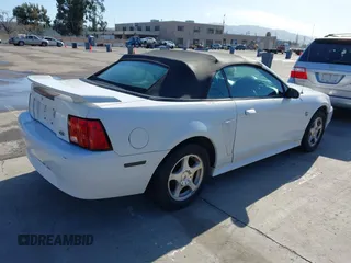 2004 Ford Mustang Deluxe with VIN 1FAFP44654F181293, listed as a IAAI auction lot 41831366 with 122,636 mi miles. Bid and sale history available at carsss.com. Image 4.